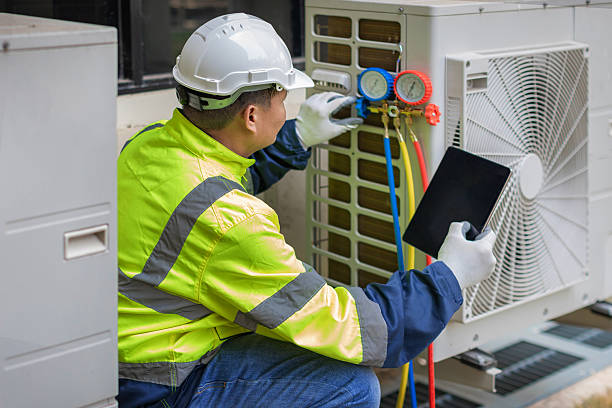Professional Heat Pump Repair technician working in Verona, OH
